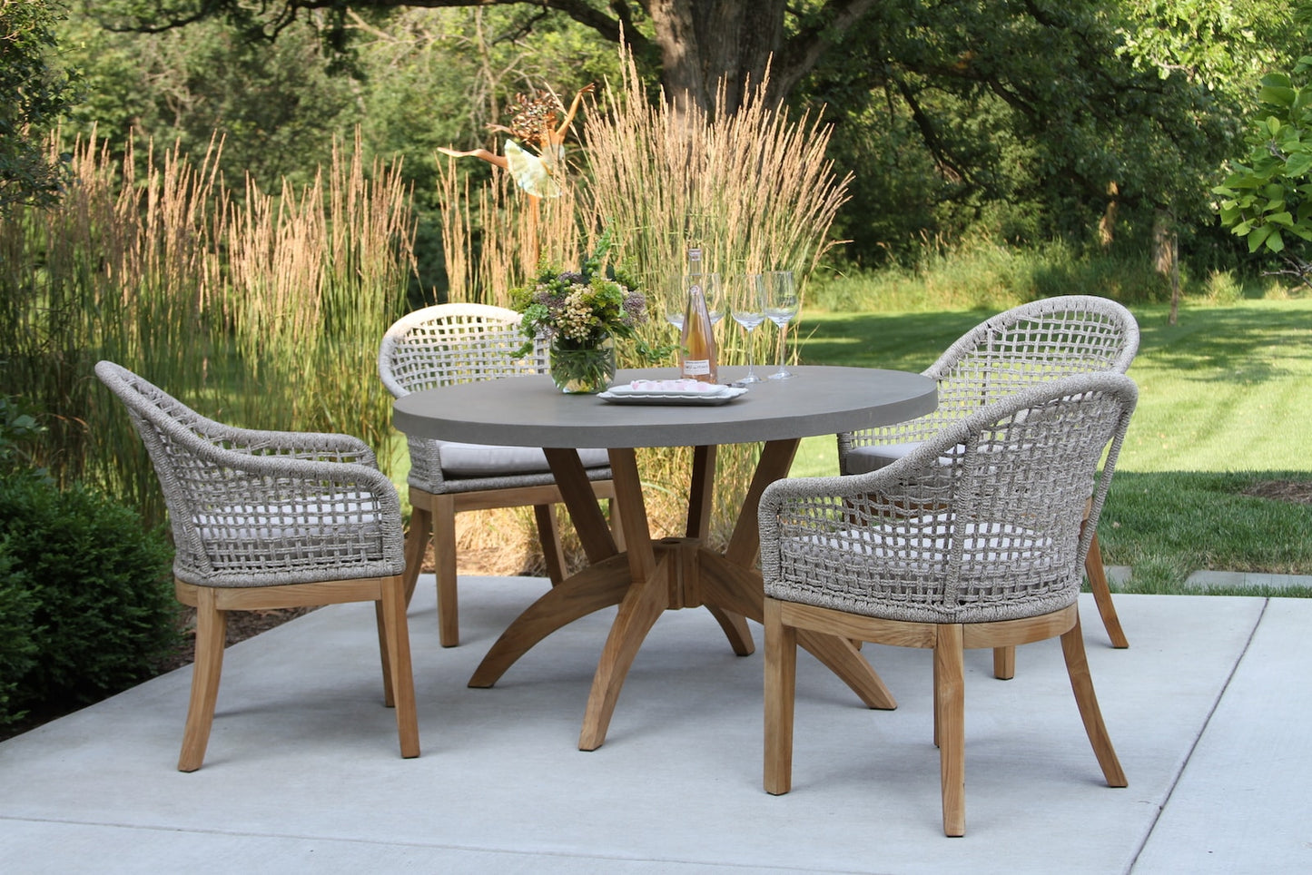 Outdoor Interiors TNA7908 Nautical Teak Composite Round Dining Table with TNA2211 Rope Chairs 5pc Set